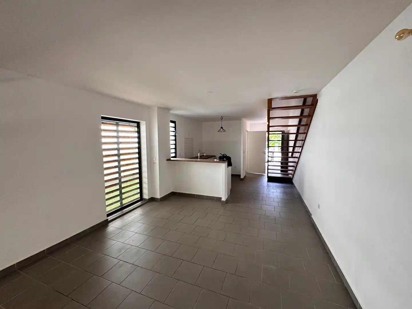 Photo 2 - Maison à louer - Ancien 1 250 € 3 pièces 2 chambres 69.28 m² Saint-Paul 97411