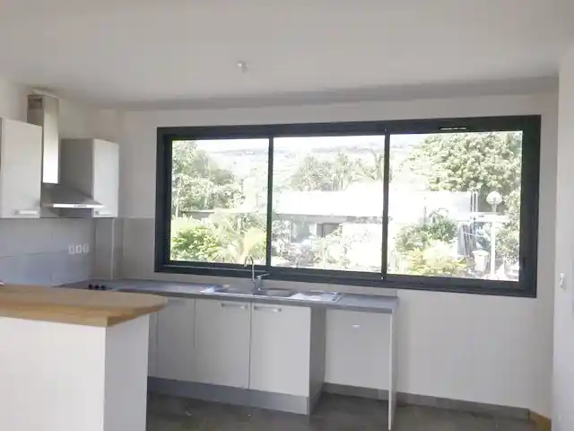 Photo 1 - Maison à louer - Ancien 1 036 € 4 pièces 3 chambres 83.64 m² Sainte-Marie 97438